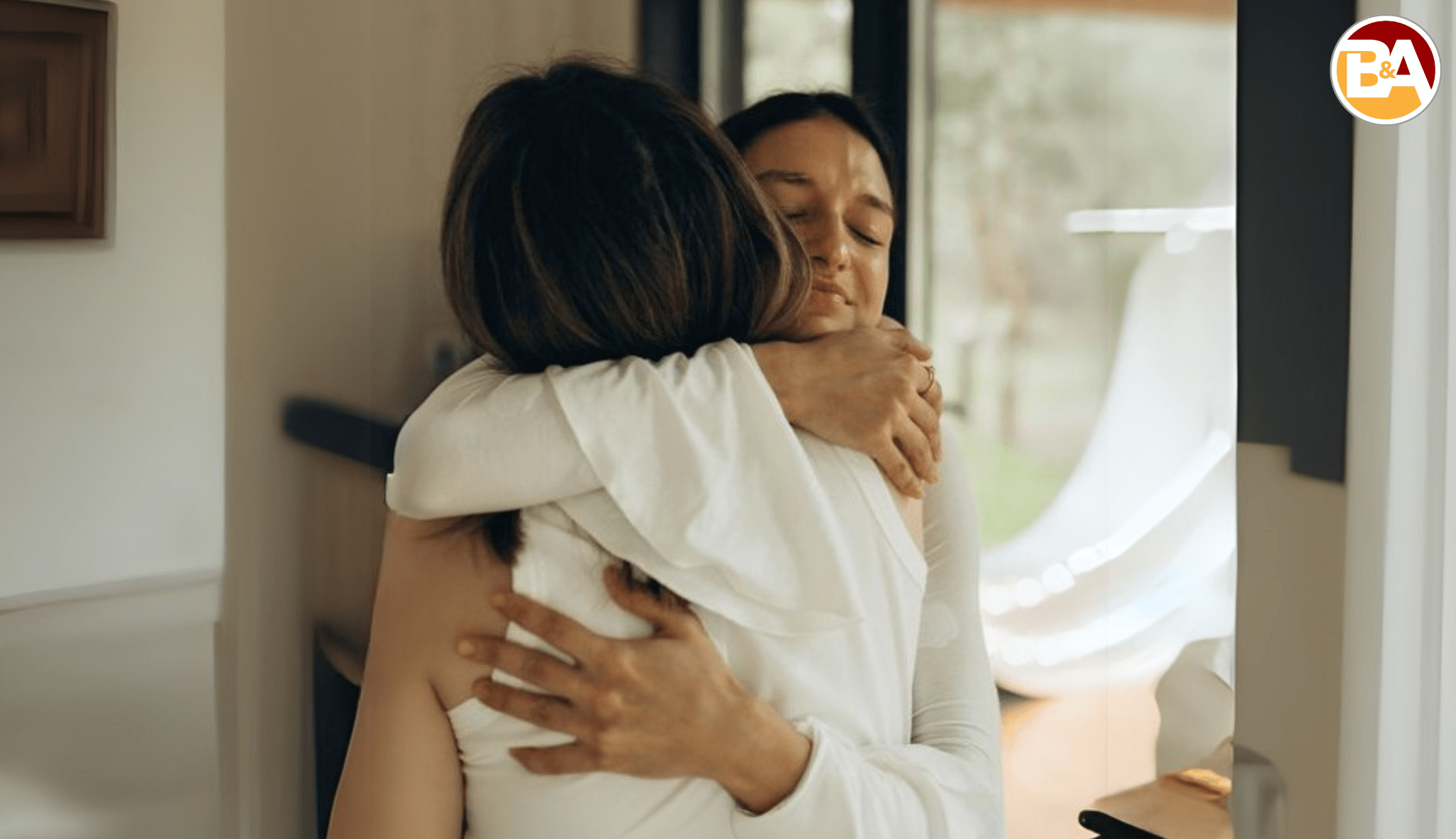A woman recognizing mental health illness comforting her with love