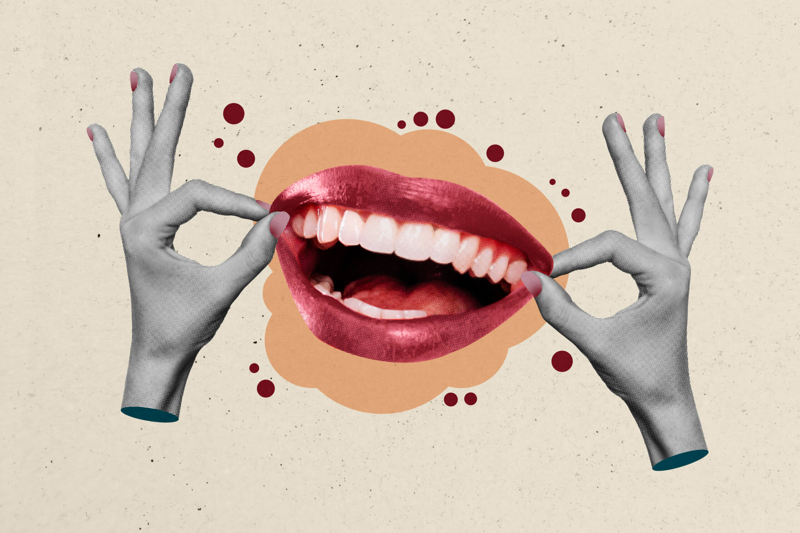 A big smile with red lips stick and a hand on the left and the right