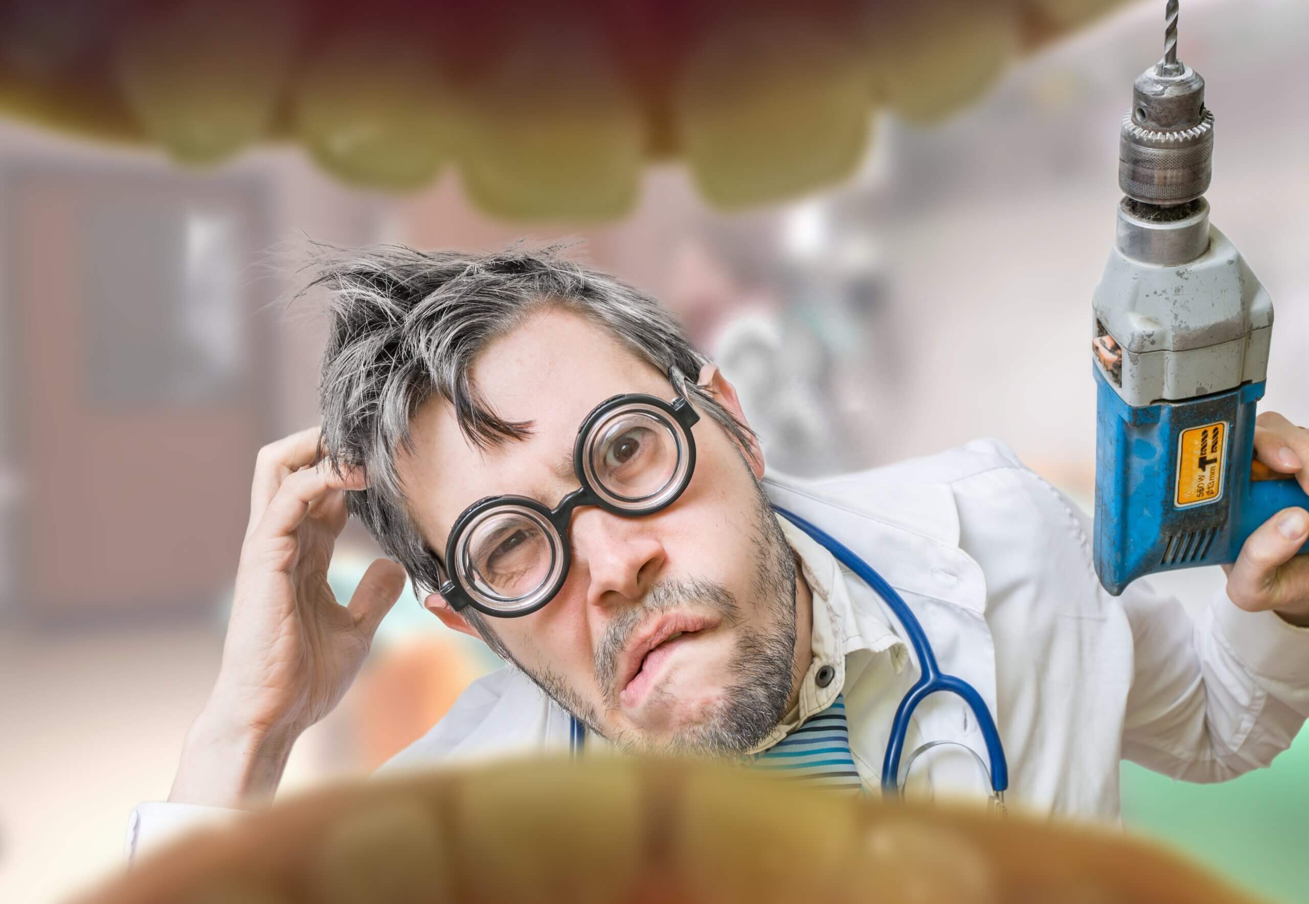 A dentist checking the oral cavities of a patient